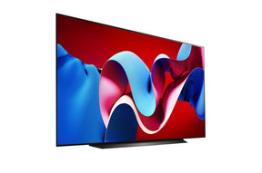 LG 83C4 OLED Televízió előlnézetben talpon, jobbra fordítva. A kijelzőn kékes piros absztakrt ábra.